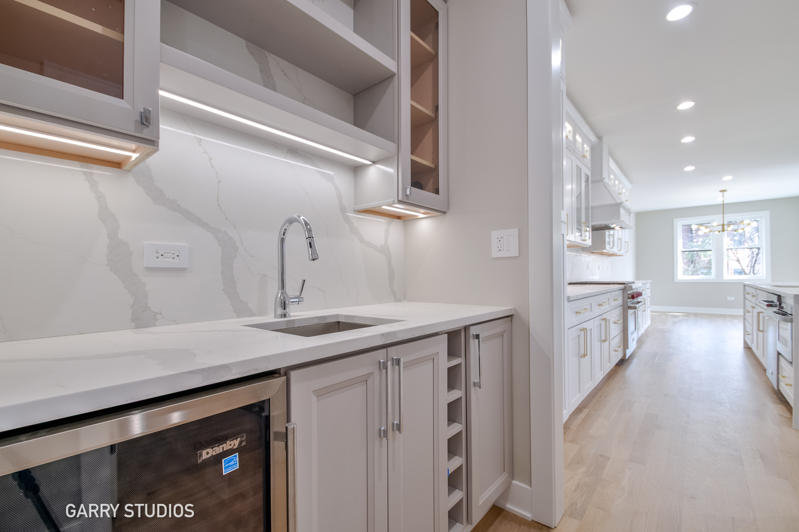 15W320 Concord Street Elmhurst, IL 60126 - Photo 7 of 20 a kitchen with a sink stove and cabinets