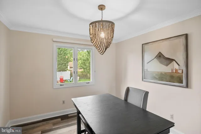 a kitchen with stainless steel appliances granite countertop a refrigerator sink and microwave