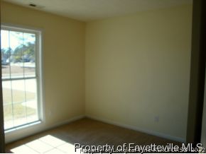 203 Kernstown Road Raeford, NC 28376 - Photo 8 of 12 an empty room with windows