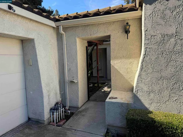 front view of a house with a small space