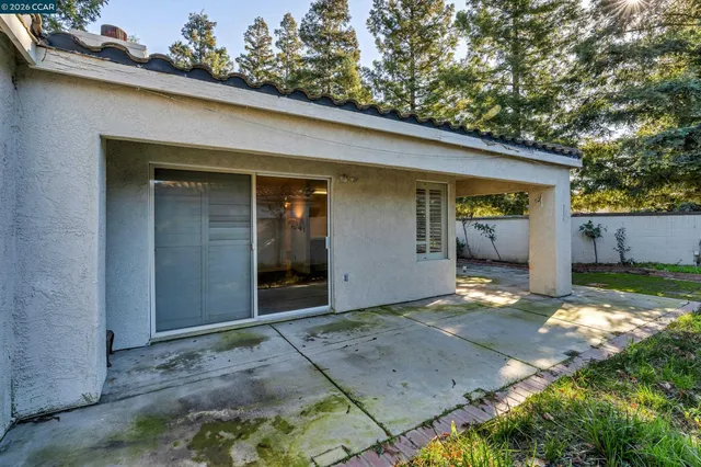 a view of house with outdoor space