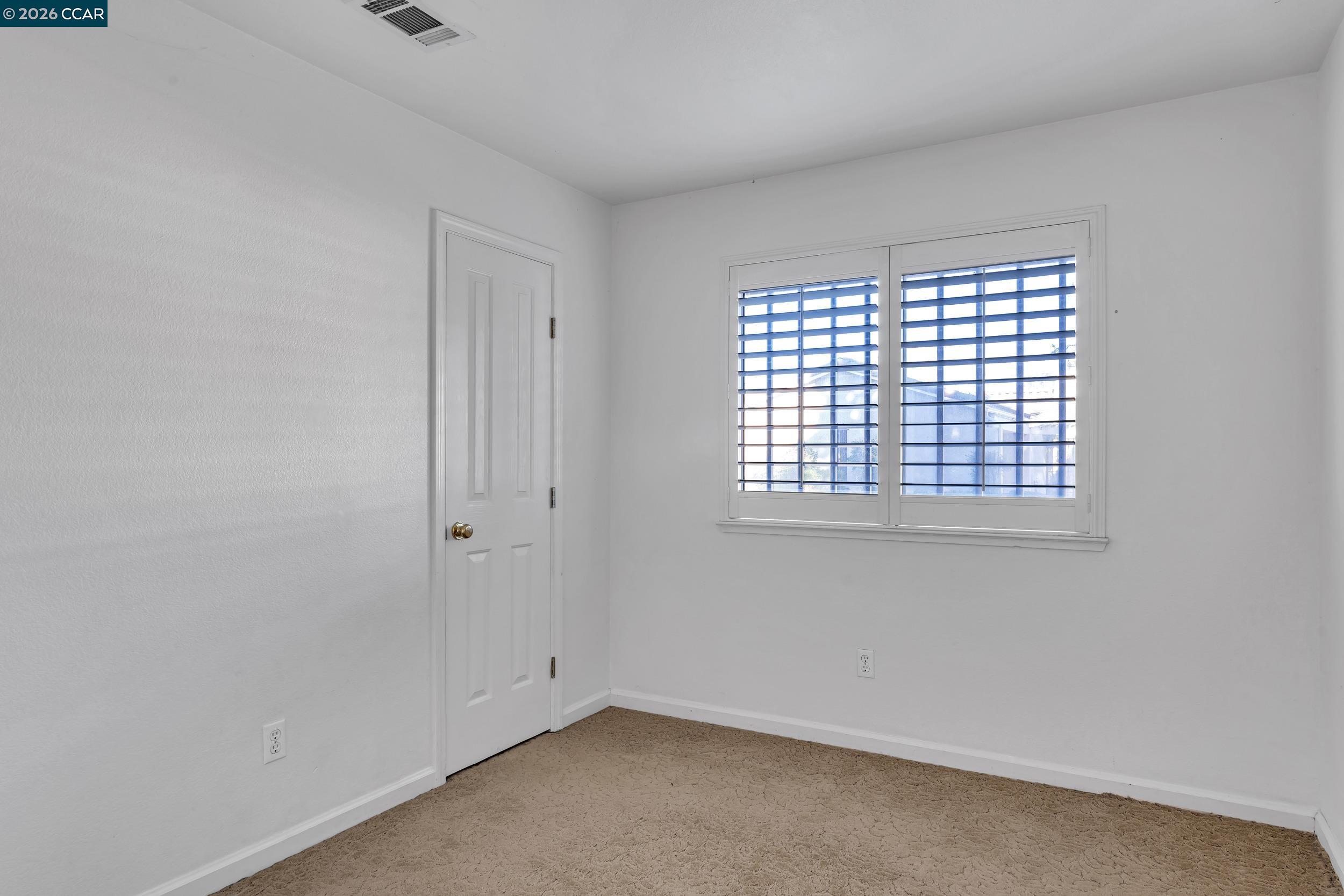 3735 Ignacio Circle Stockton, CA 95209 - Photo 6 of 22 an empty room with a window