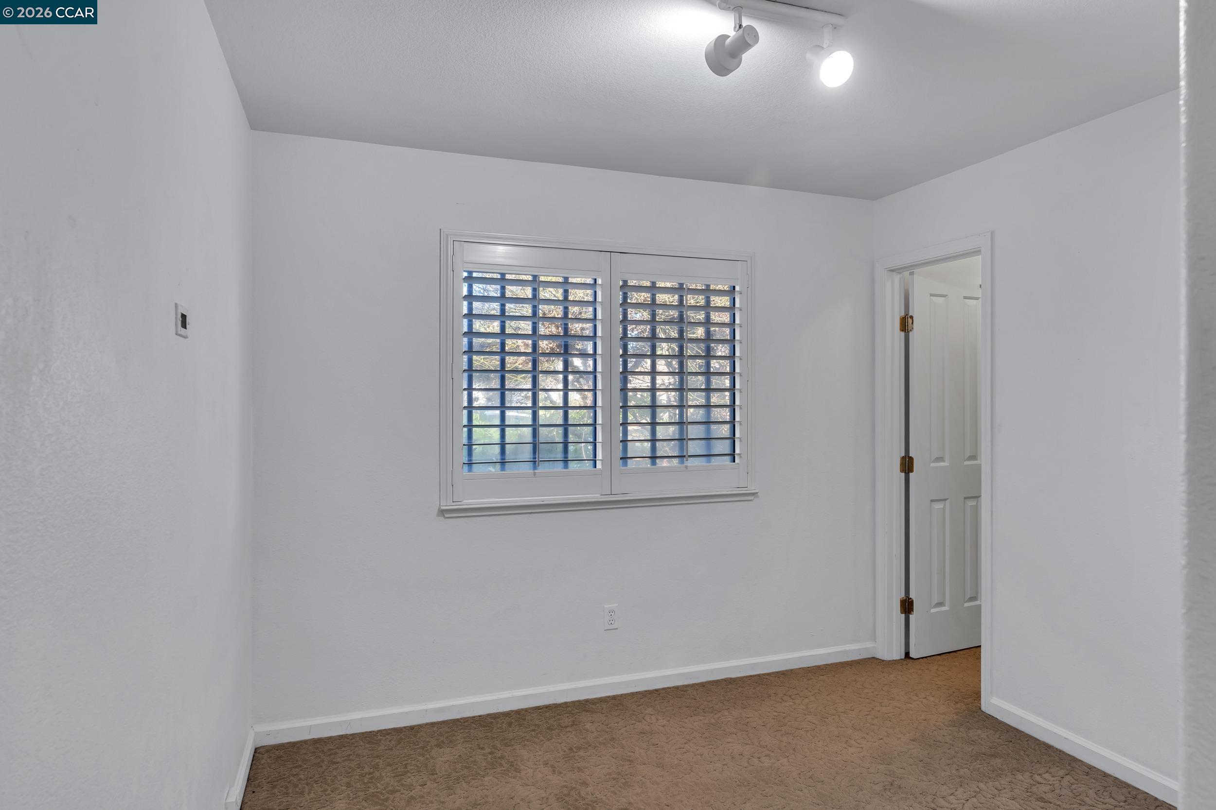 3735 Ignacio Circle Stockton, CA 95209 - Photo 7 of 22 an empty room with a window