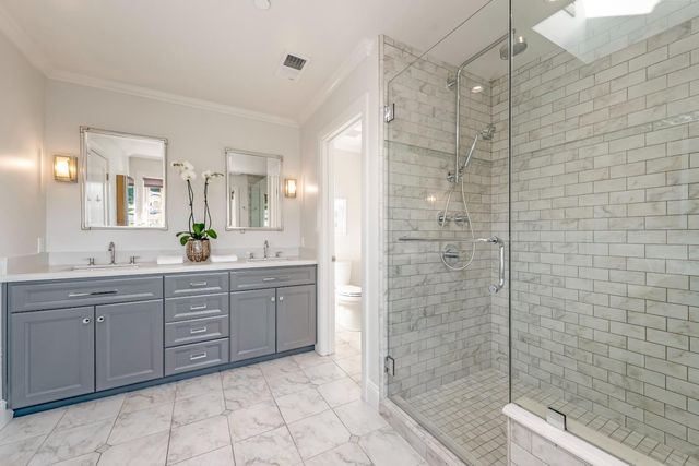 a work room with furniture and a window