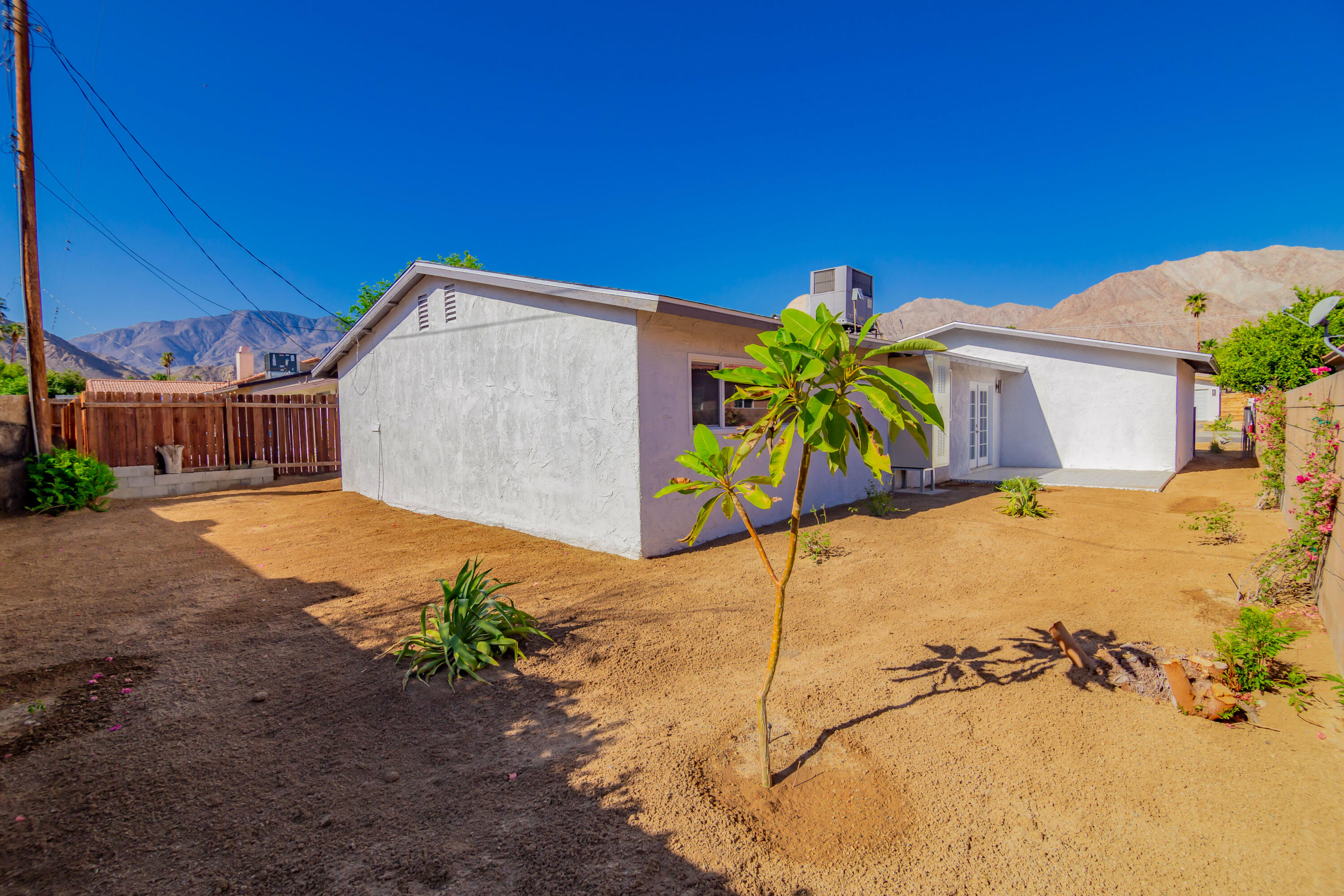 52880 Avenida Navarro La Quinta, CA 92253 - Photo 23 of 27 a view of a swimming pool with a yard