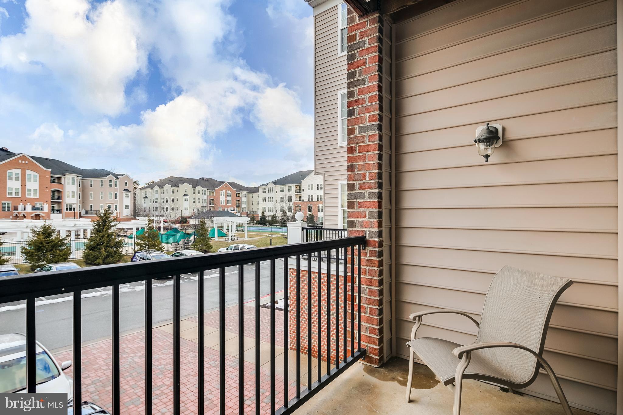 7315 Brookview Road, Unit 208 Elkridge, MD 21075 - Photo 28 of 40 Balcony overlooks Pool/Tennis & Community Center