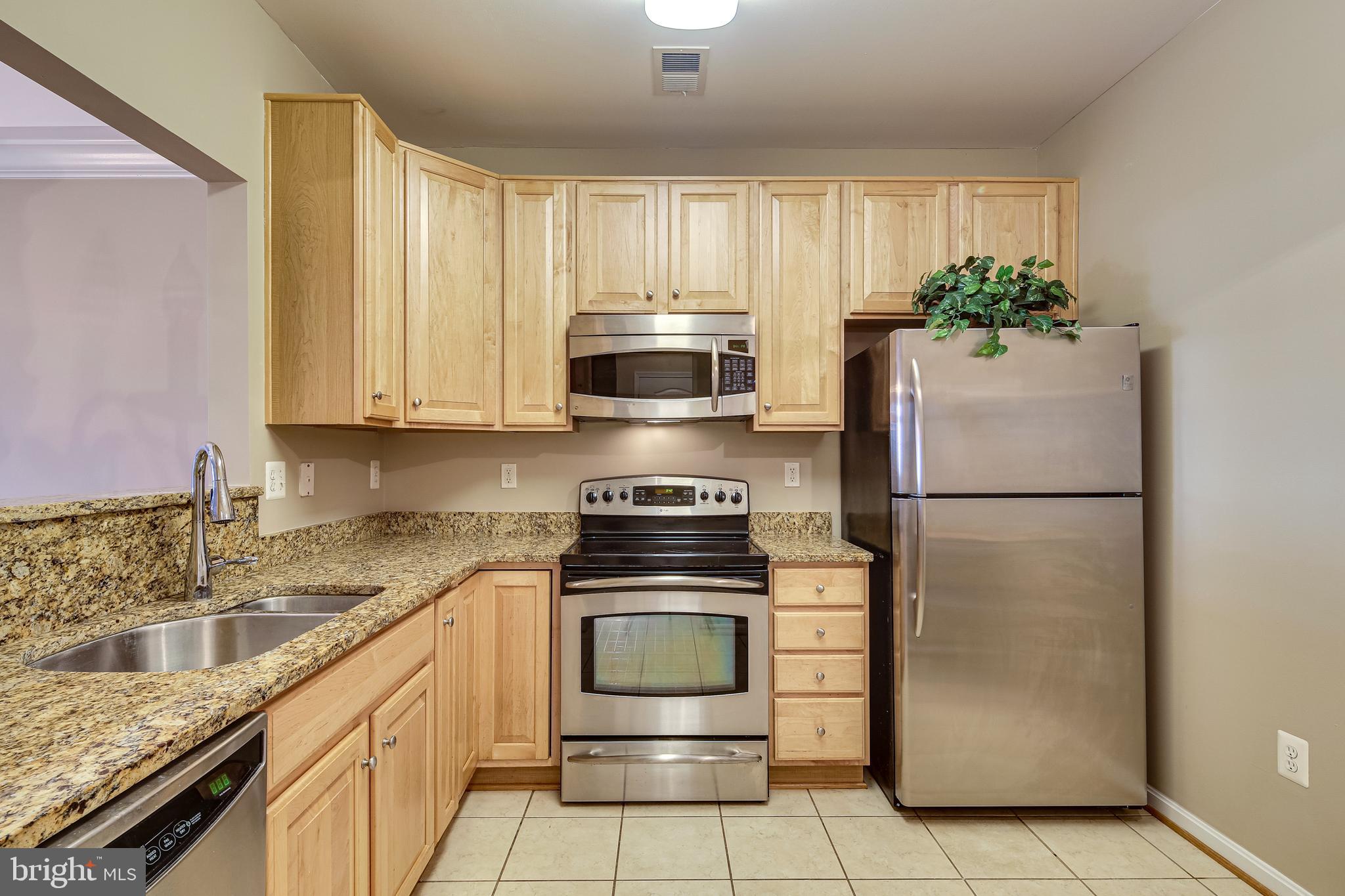 7315 Brookview Road, Unit 208 Elkridge, MD 21075 - Photo 9 of 40 42" Raised Light Oak Cabinetry