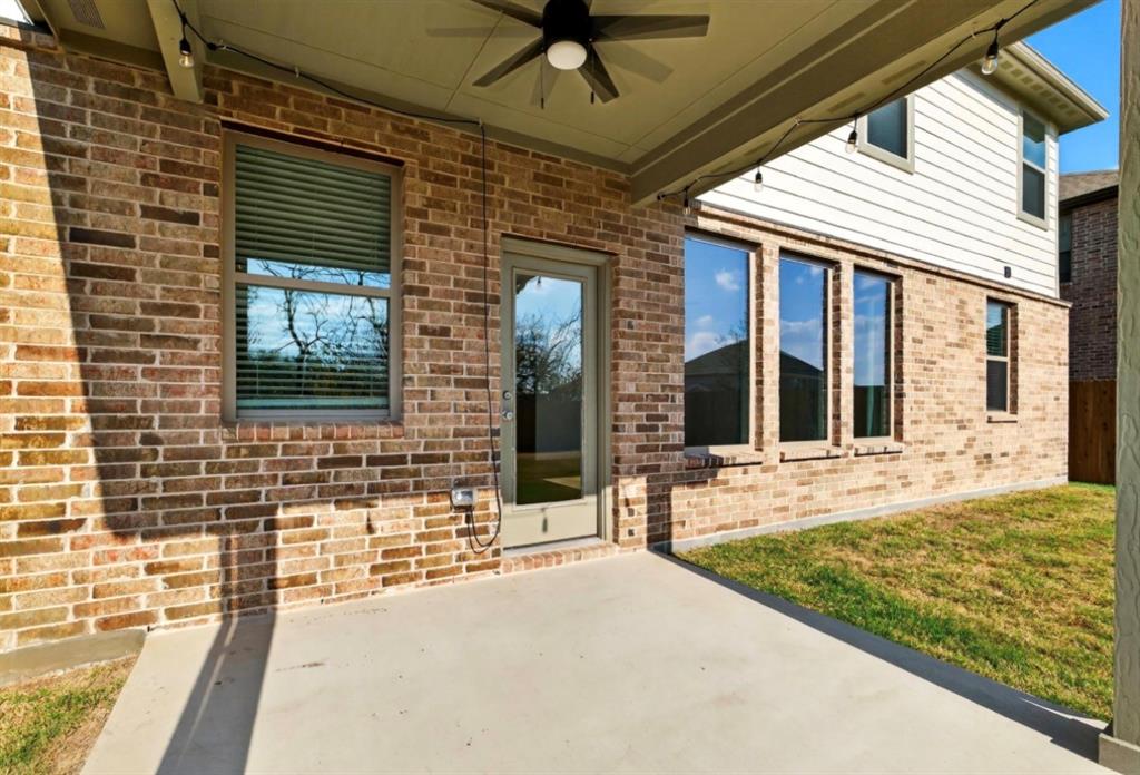 2325 Myrtle Way Melissa, TX 75454 - Photo 23 of 29 a view of a brick house with a large window