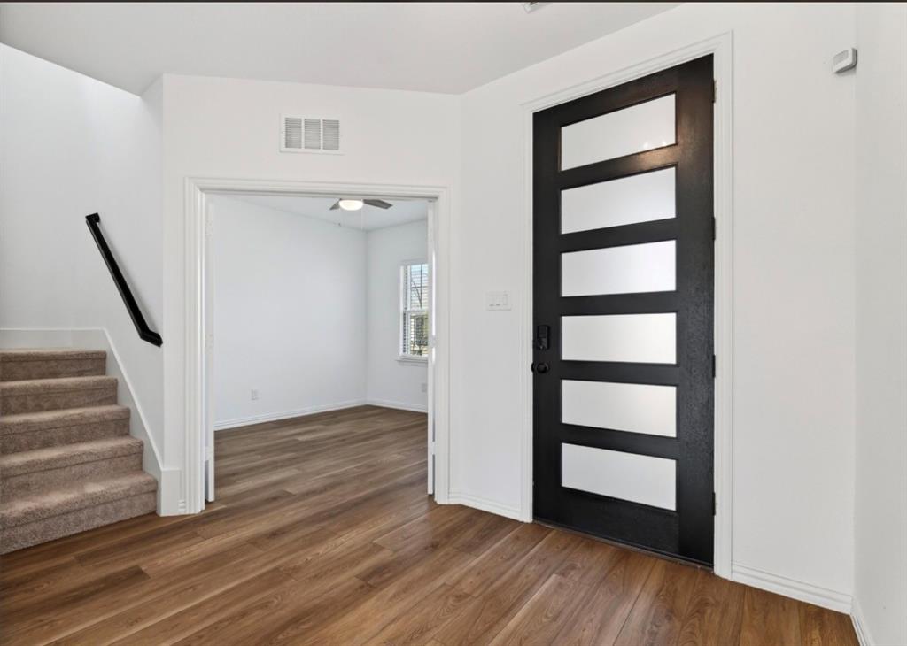 2325 Myrtle Way Melissa, TX 75454 - Photo 4 of 29 a view of front door with wooden floor and stairs