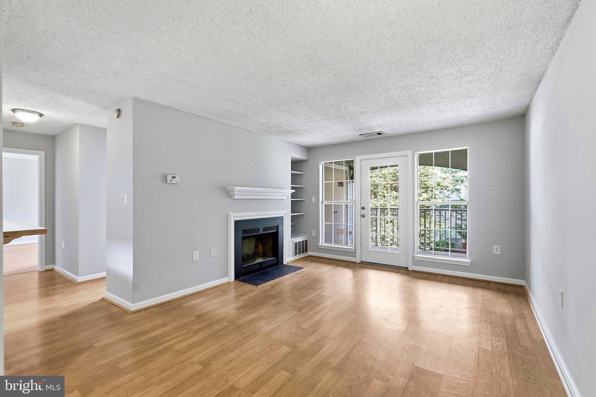 20991 Timber Ridge Terrace, Unit 203 Ashburn, VA 20147 - Photo 3 of 20 Family/Living Room