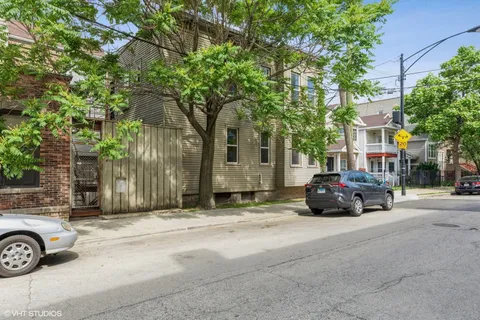 a car parked in front of a house