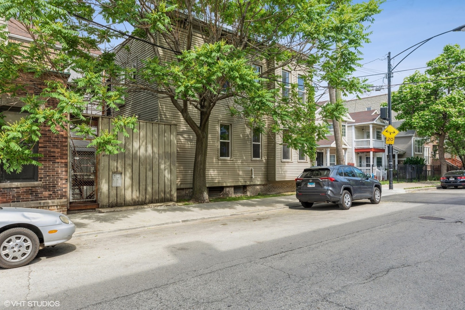 626 West 18th Street, Unit RH1 Chicago, IL 60616 - Photo 1 of 13 a car parked in front of a house