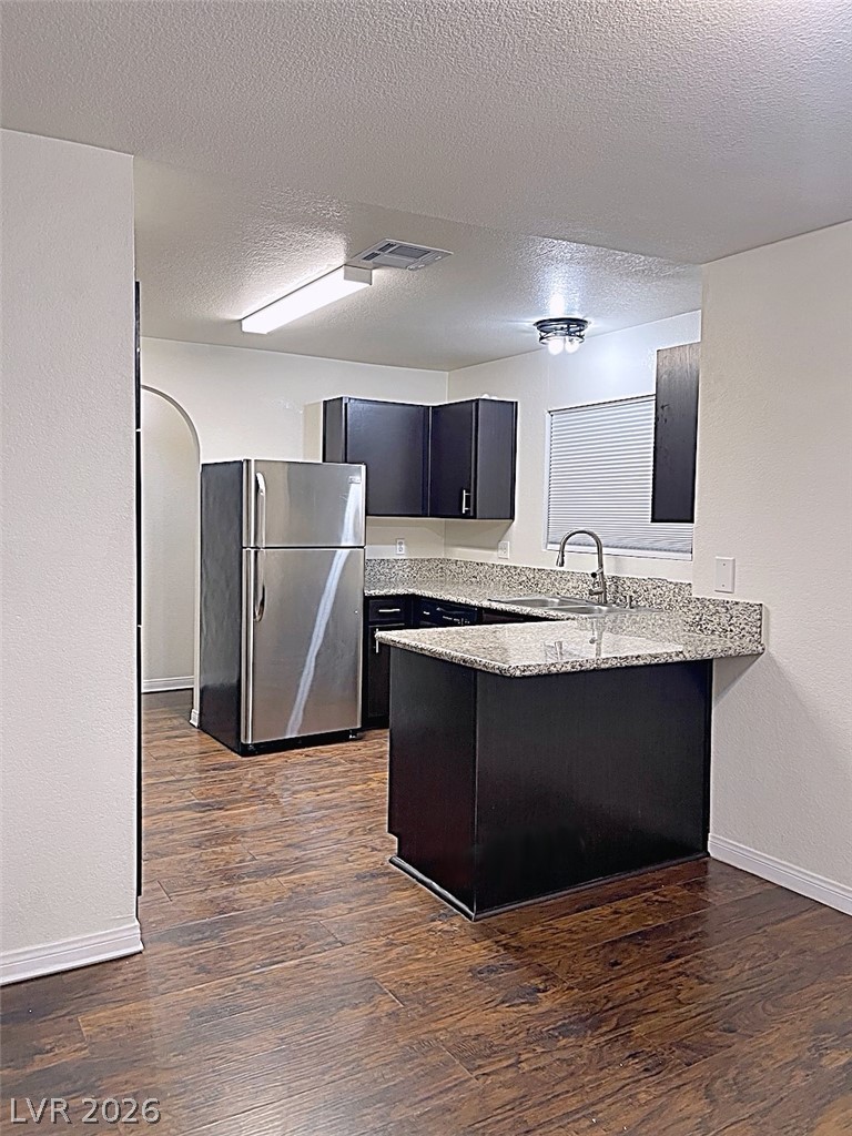 2200 South Fort Apache Road, Unit 2201 Las Vegas, NV 89117 - Photo 1 of 33 This bright kitchen features durable flooring and ample counter space for culinary endeavors.