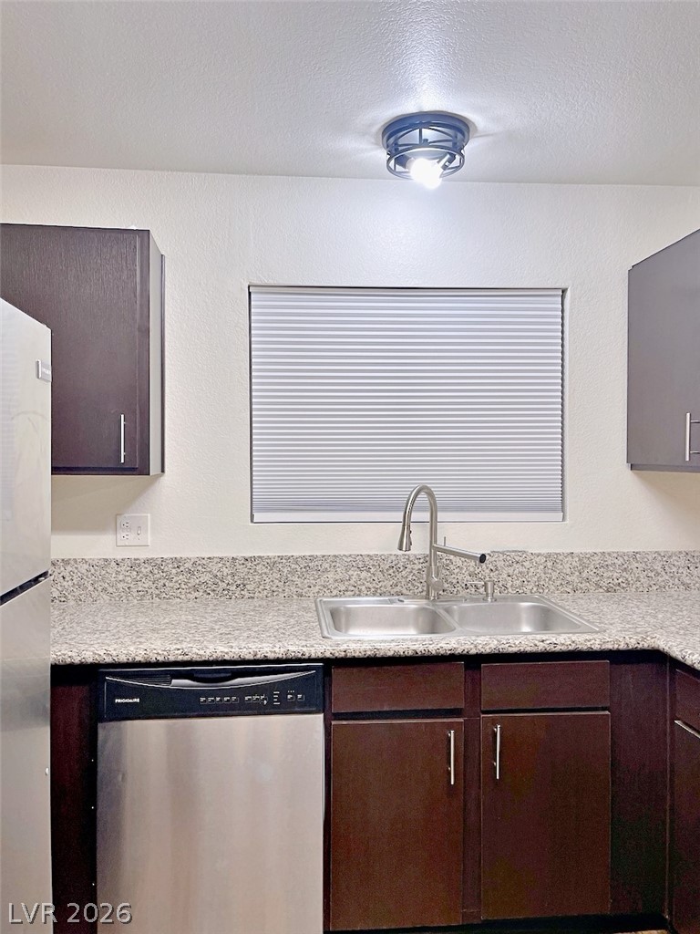 2200 South Fort Apache Road, Unit 2201 Las Vegas, NV 89117 - Photo 11 of 33 This efficient kitchen offers ample counter space and essential appliances for everyday living.