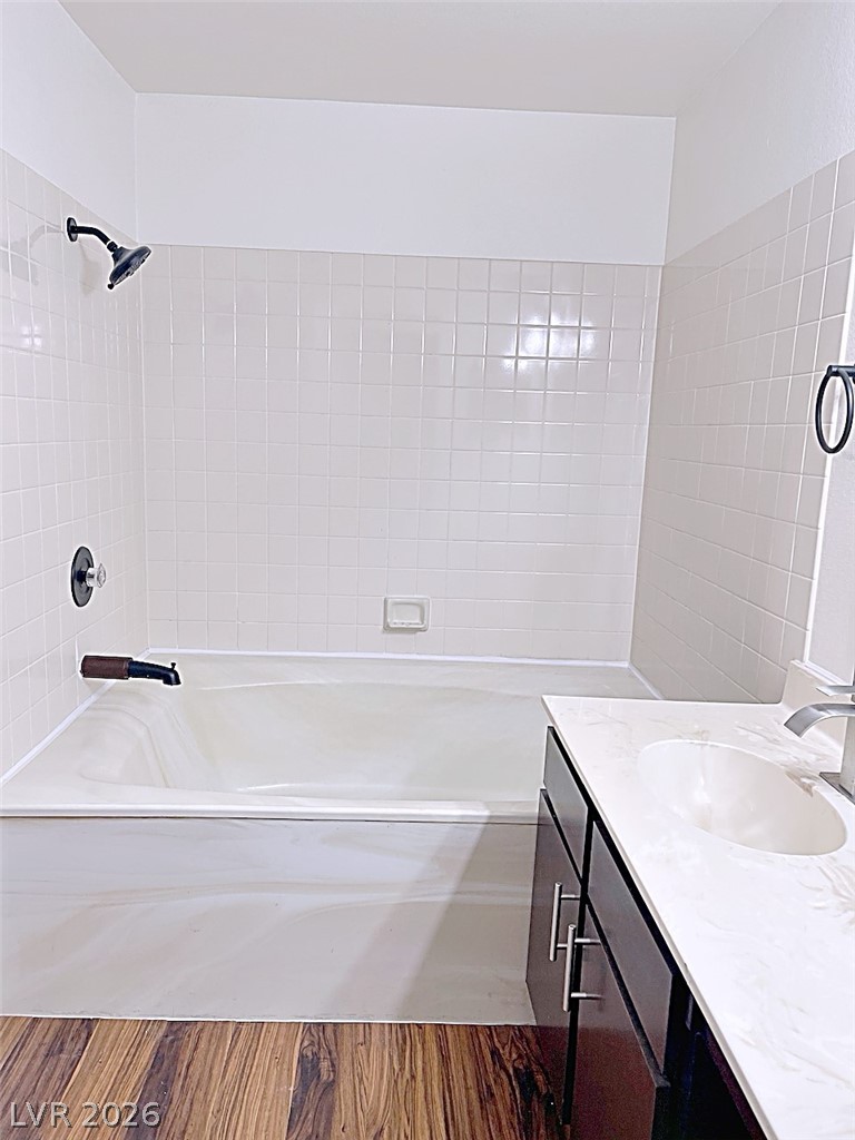 2200 South Fort Apache Road, Unit 2201 Las Vegas, NV 89117 - Photo 23 of 33 This clean bathroom offers a soothing tub and vanity with modern hardware, perfect for daily routines.