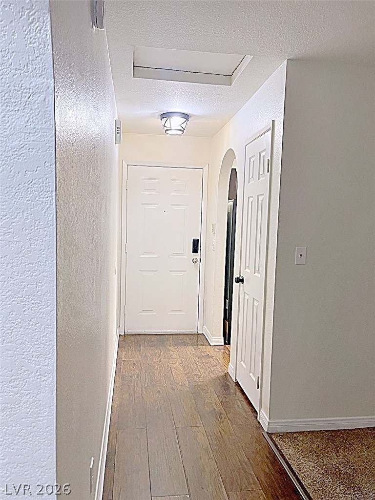 2200 South Fort Apache Road, Unit 2201 Las Vegas, NV 89117 - Photo 5 of 33 This inviting entryway offers a warm welcome with rich flooring and classic architectural details.