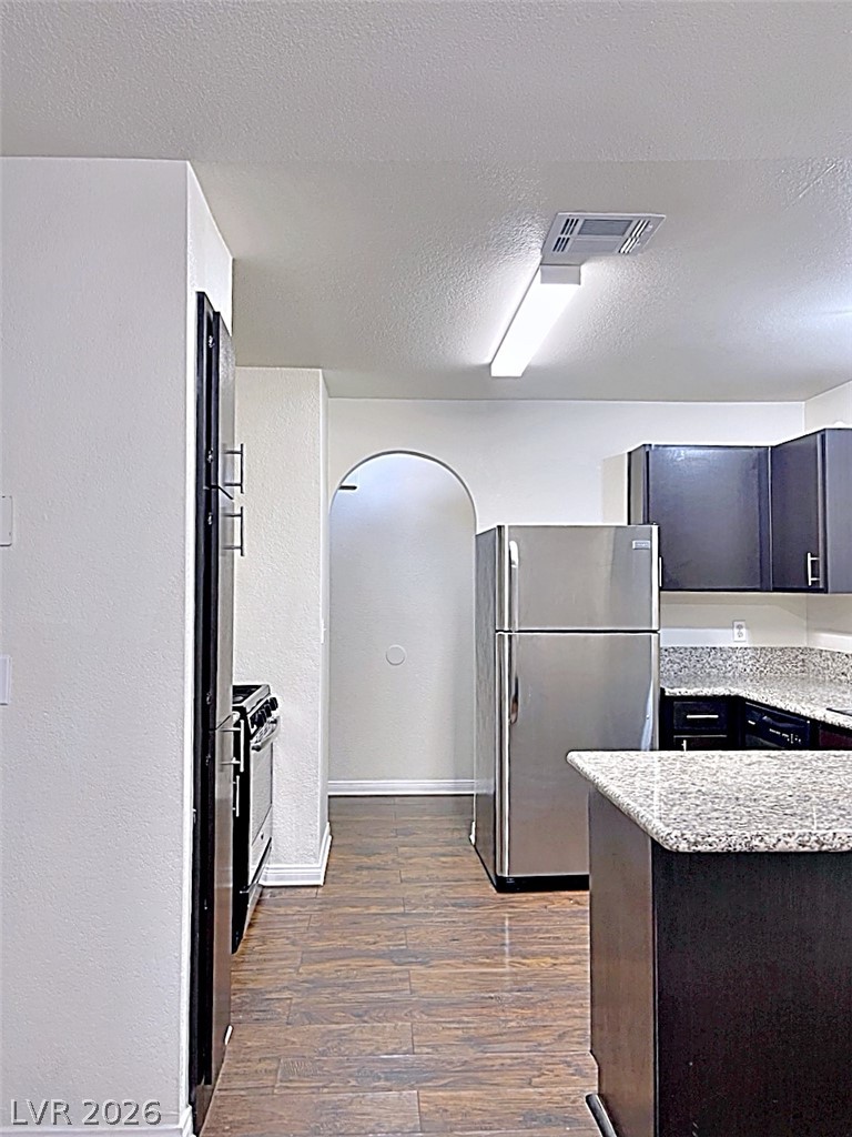 2200 South Fort Apache Road, Unit 2201 Las Vegas, NV 89117 - Photo 9 of 33 This modern kitchen features durable flooring and sleek appliances.