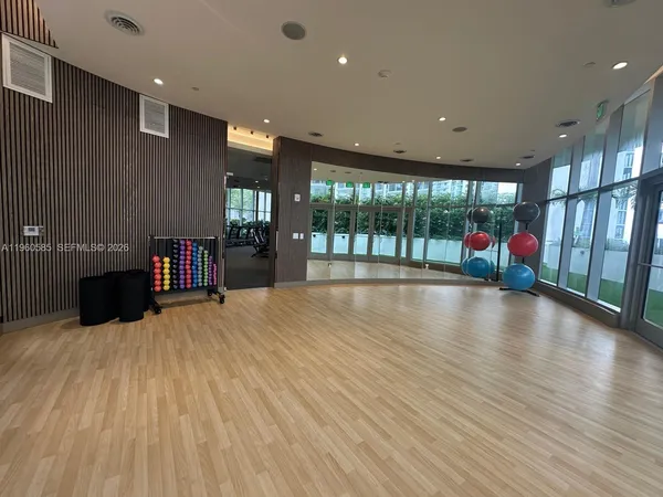a view of a hall with stairs