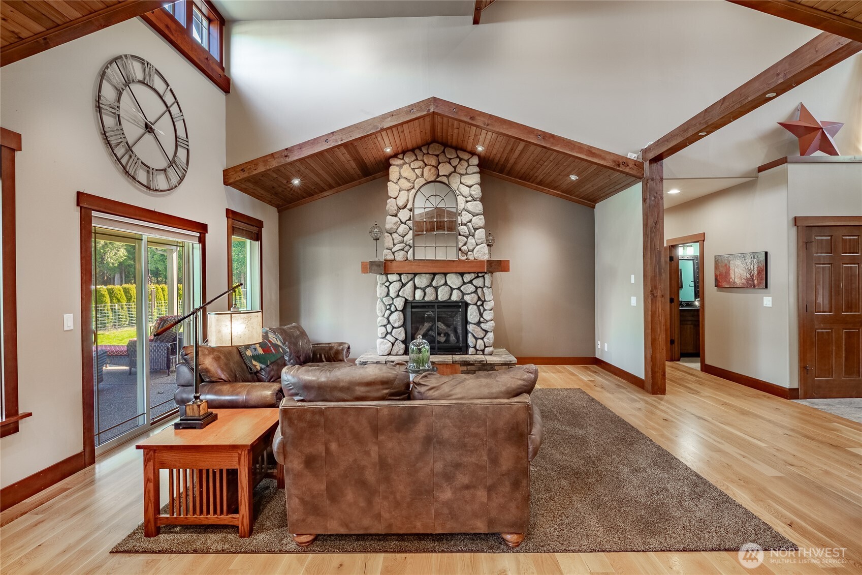 8138 Percie Road Custer, WA 98240 - Photo 12 of 40 a living room with furniture a window and a clock