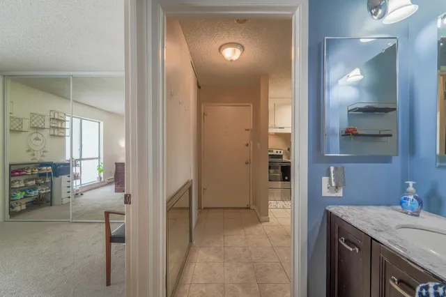a bedroom with a bed and a cabinets