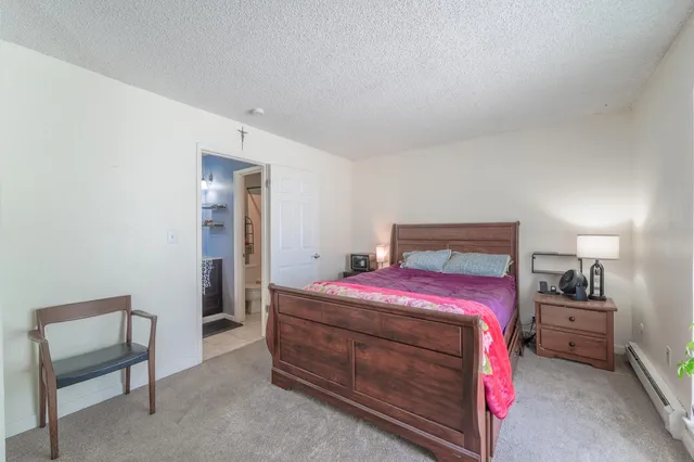 a swimming pool with outdoor seating and yard