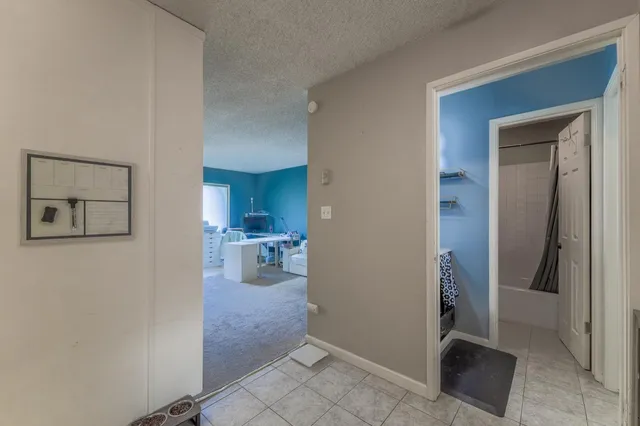 a living room with furniture and a yard