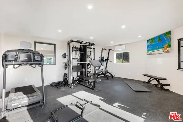 a view of a large building with a mountain in the background