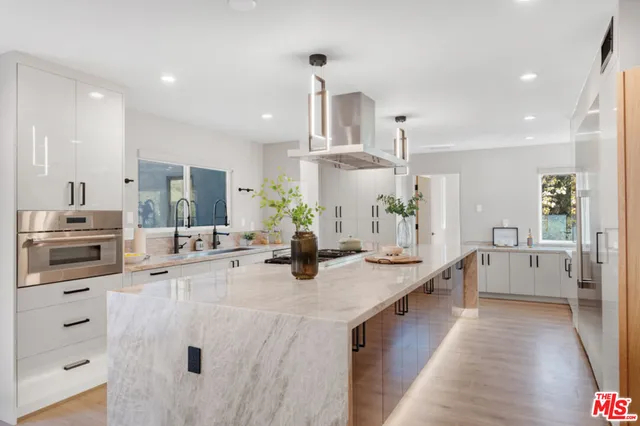 a bedroom with furniture and a fireplace