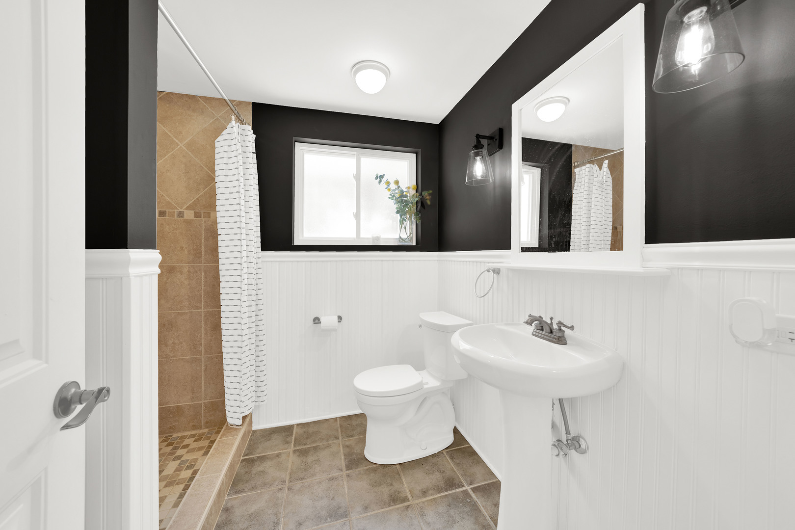 9737 West 57th Street Countryside, IL 60525 - Photo 11 of 19 a bathroom with a toilet sink and mirror
