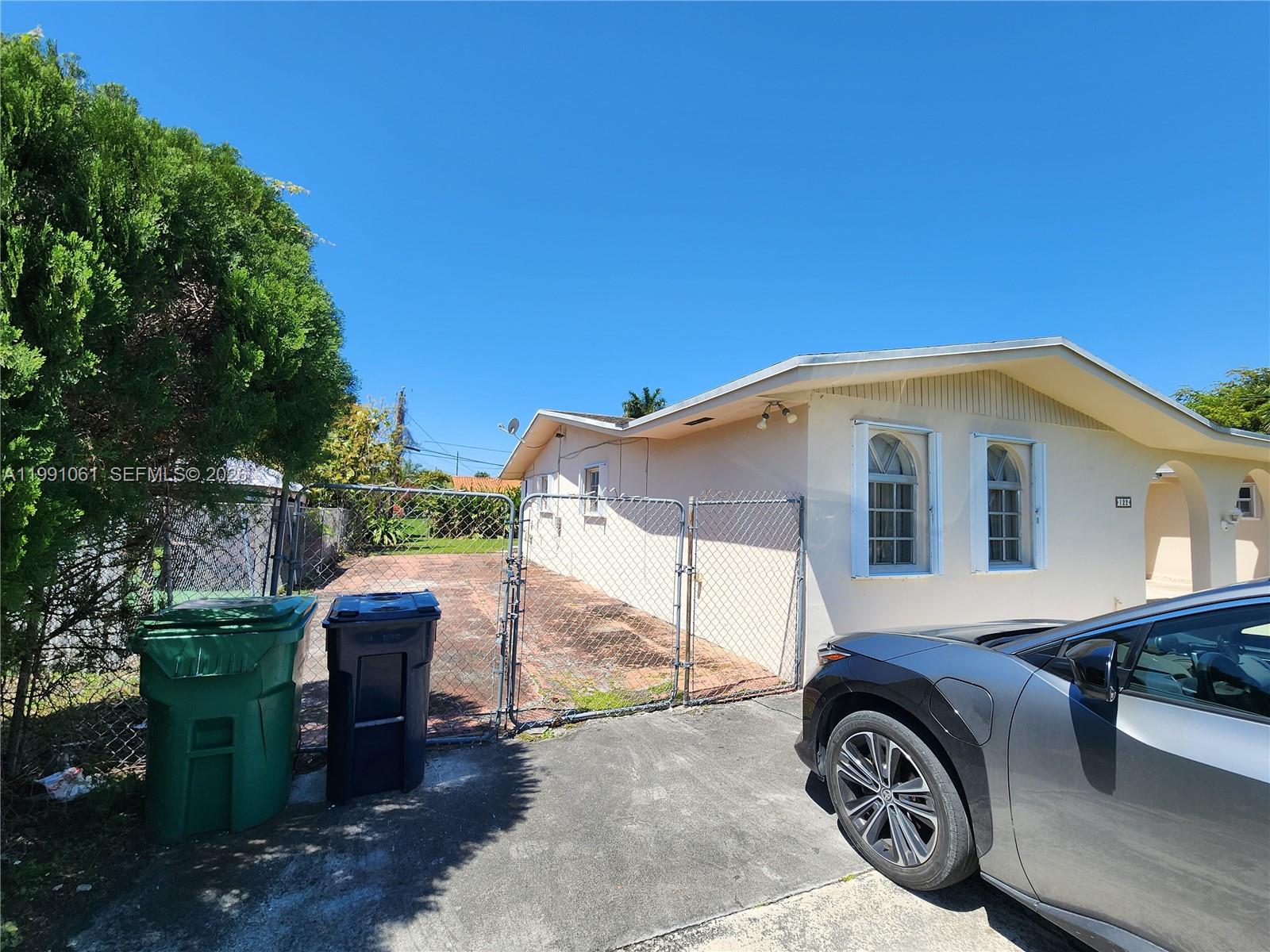 120 Southwest 80th Avenue Miami, FL 33144 - Photo 3 of 10 a house view with a garden space