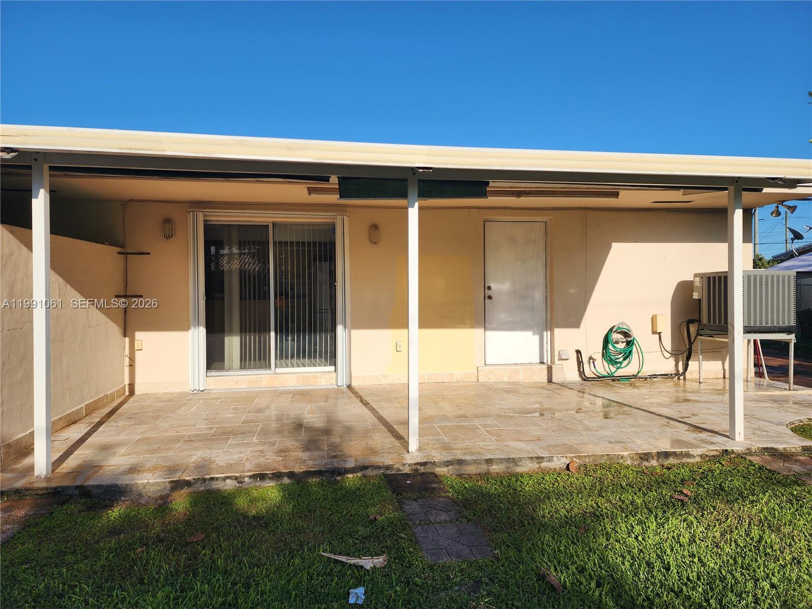 120 Southwest 80th Avenue Miami, FL 33144 - Photo 7 of 10 a view of a house with backyard