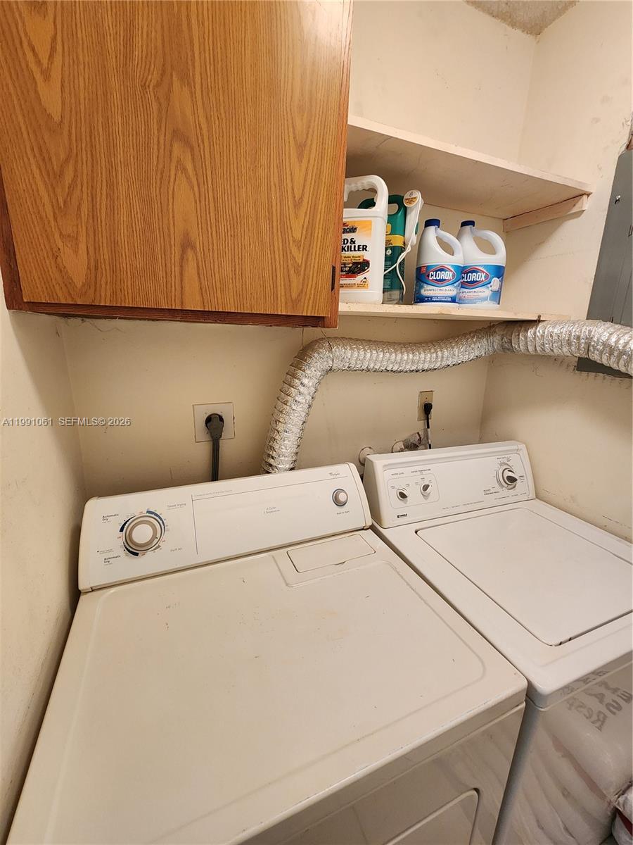 120 Southwest 80th Avenue Miami, FL 33144 - Photo 9 of 10 a utility room with dryer and washer