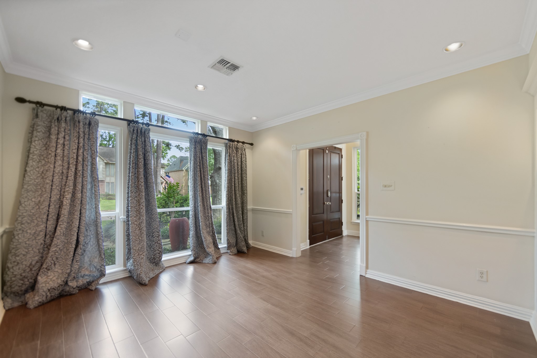 5115 Westerham Place Houston, TX 77069 - Photo 18 of 48 Formal Dining with custom draperies