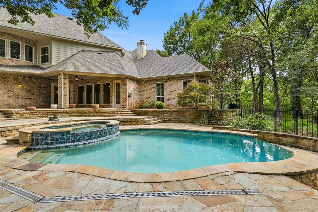 970 Crystal Cove Oak Point, TX 75068 - Photo 31 of 40 a view of a house with swimming pool and sitting area