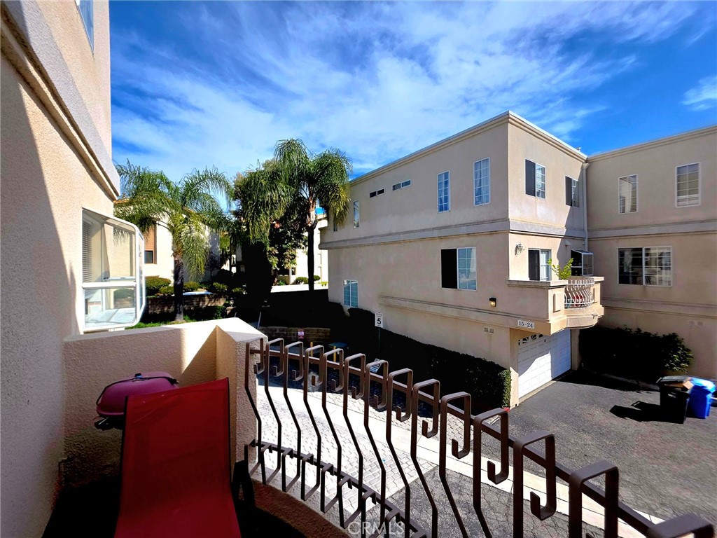 5340 Las Virgenes Road, Unit 1 Calabasas, CA 91302 - Photo 11 of 23 a backyard of a house with table and chairs