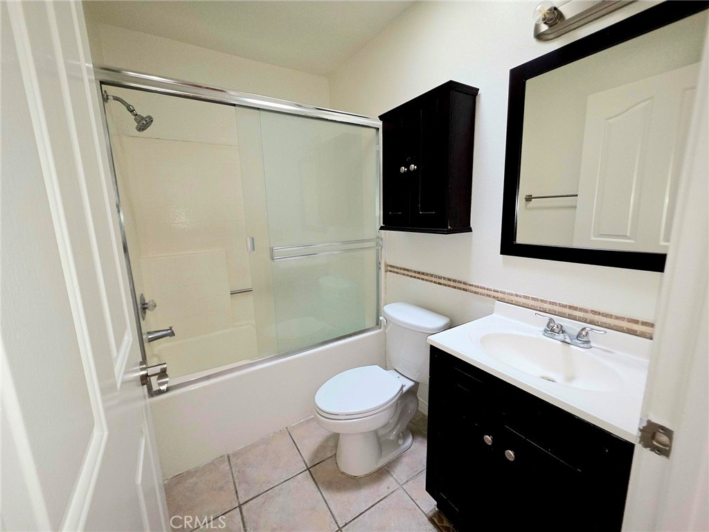 5340 Las Virgenes Road, Unit 1 Calabasas, CA 91302 - Photo 18 of 23 a bathroom with a sink a toilet and shower