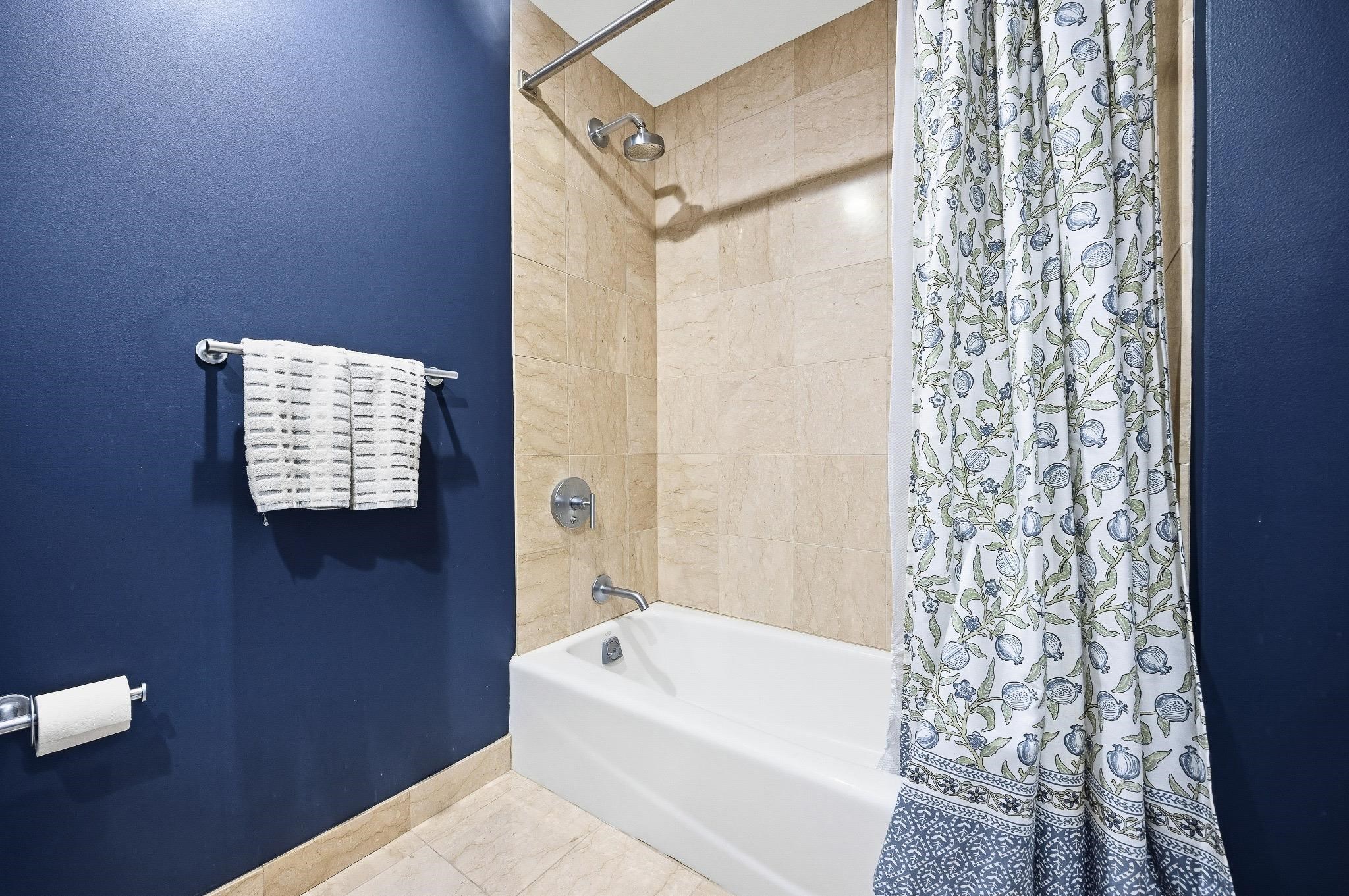 8100 River Road, Unit 1203 North Bergen, NJ 07047 - Photo 10 of 31 a bathroom with a bathtub and shower