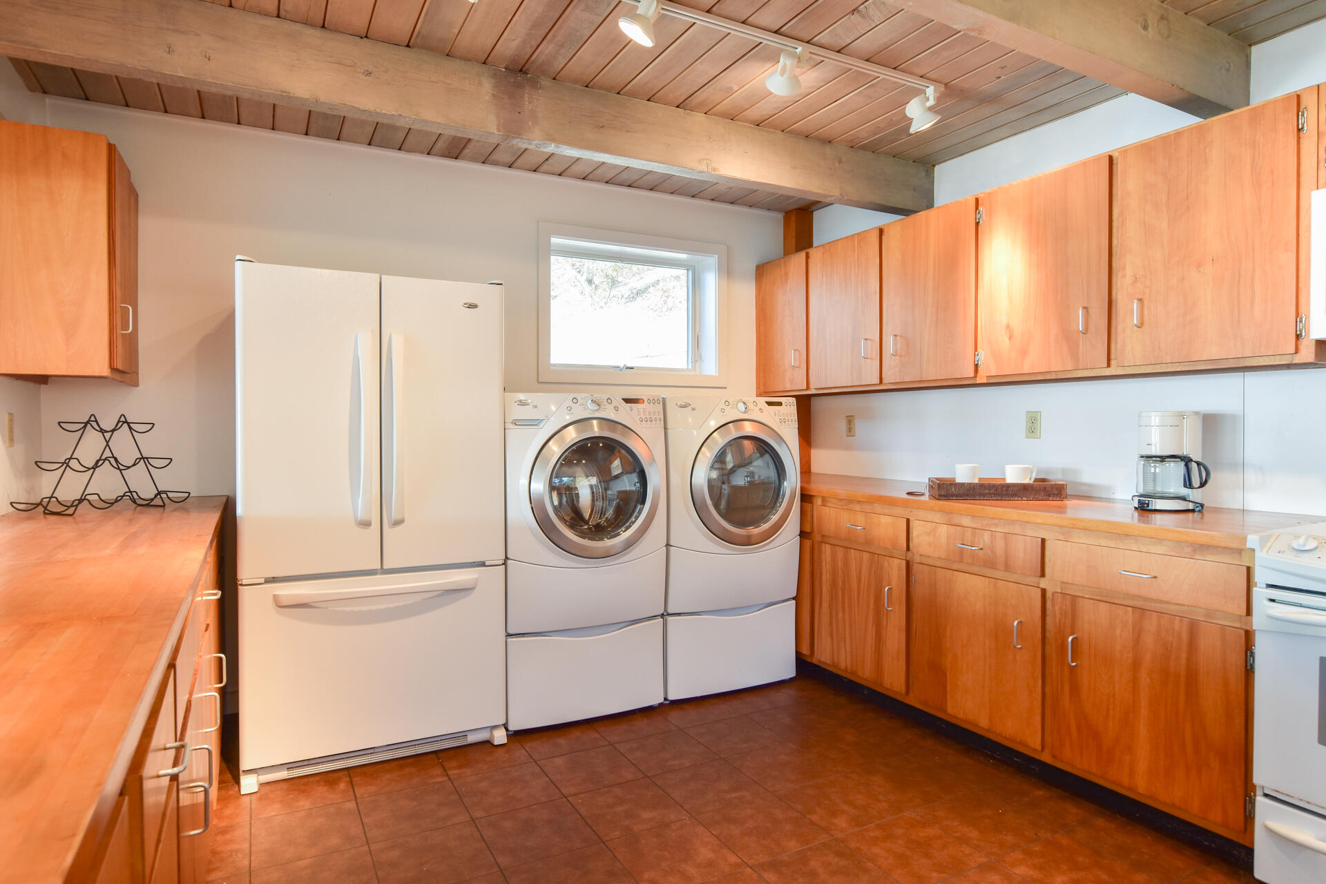 945 Chequessett Neck Road Wellfleet, MA 02667 - Photo 14 of 57 a utility room with dryer and washer