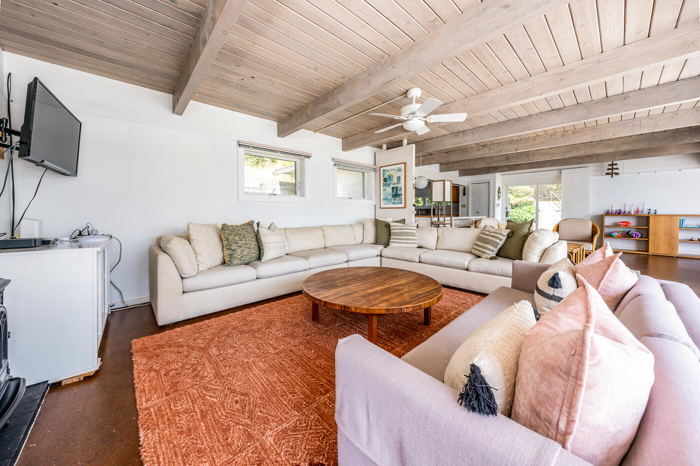 945 Chequessett Neck Road Wellfleet, MA 02667 - Photo 18 of 57 a living room with furniture and a flat screen tv