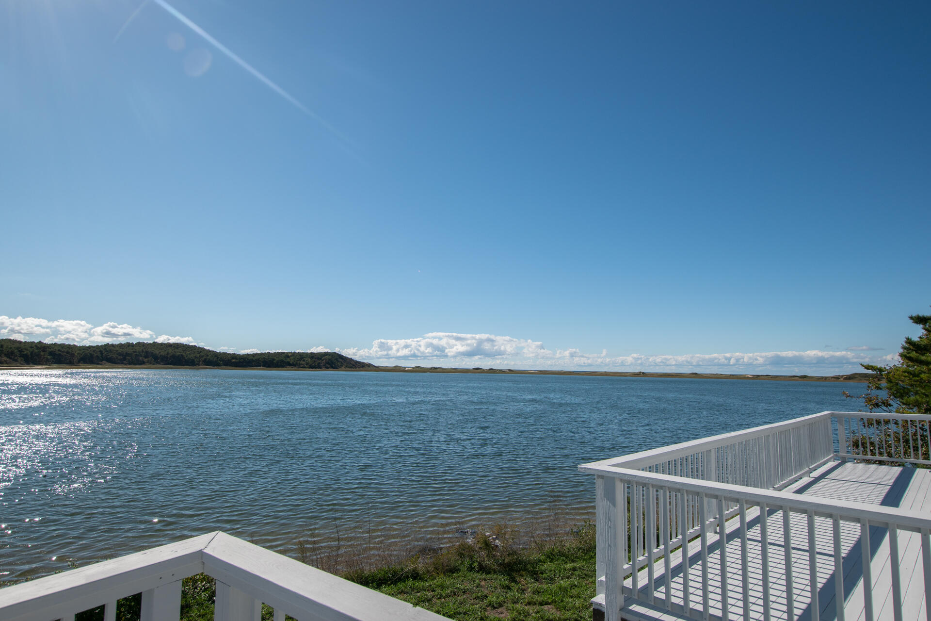 945 Chequessett Neck Road Wellfleet, MA 02667 - Photo 2 of 57 a view of ocean from a balcony