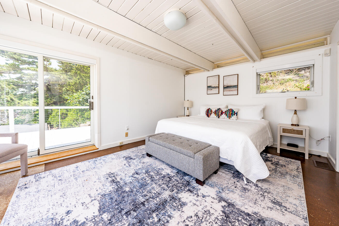 945 Chequessett Neck Road Wellfleet, MA 02667 - Photo 22 of 57 a spacious bedroom with a bed and a window