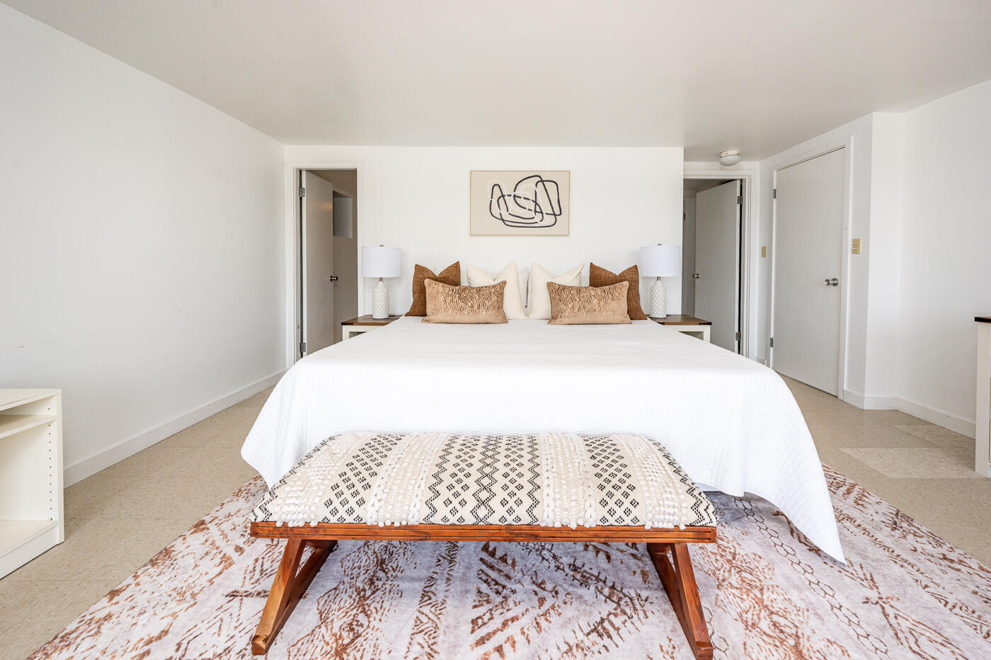 945 Chequessett Neck Road Wellfleet, MA 02667 - Photo 27 of 57 a bed sitting in a bedroom and a table