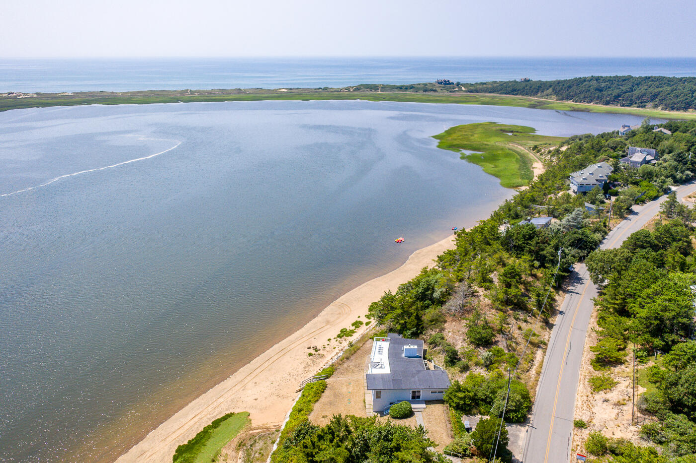 945 Chequessett Neck Road Wellfleet, MA 02667 - Photo 43 of 57 a view of a city and an ocean view