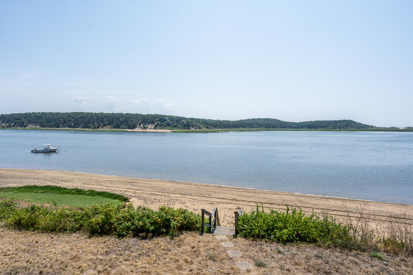 945 Chequessett Neck Road Wellfleet, MA 02667 - Photo 46 of 57 a view of a lake with a big yard