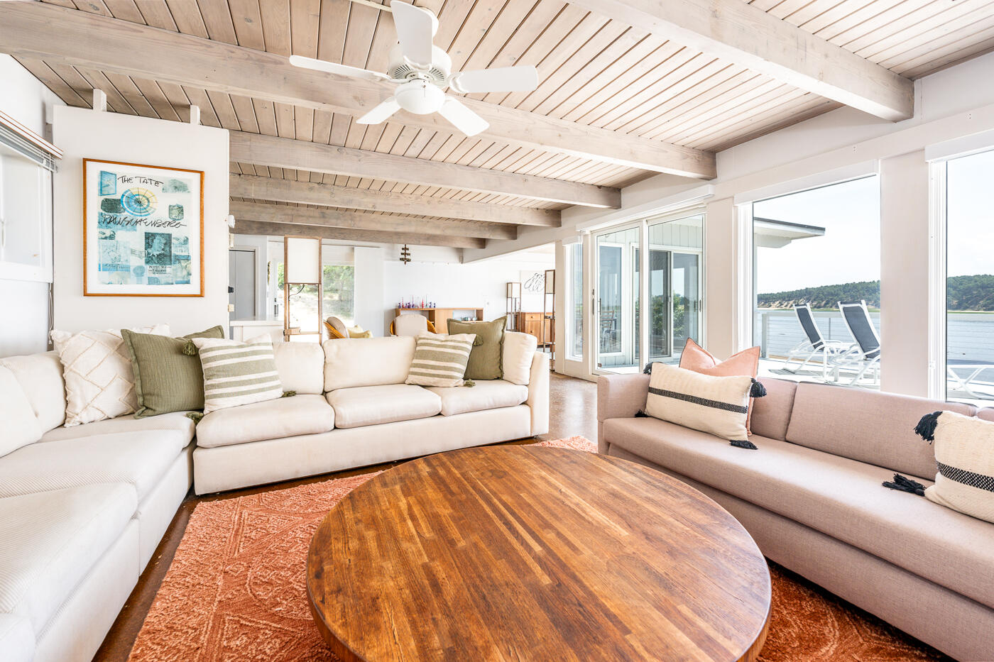 945 Chequessett Neck Road Wellfleet, MA 02667 - Photo 5 of 57 a living room with furniture and a large window