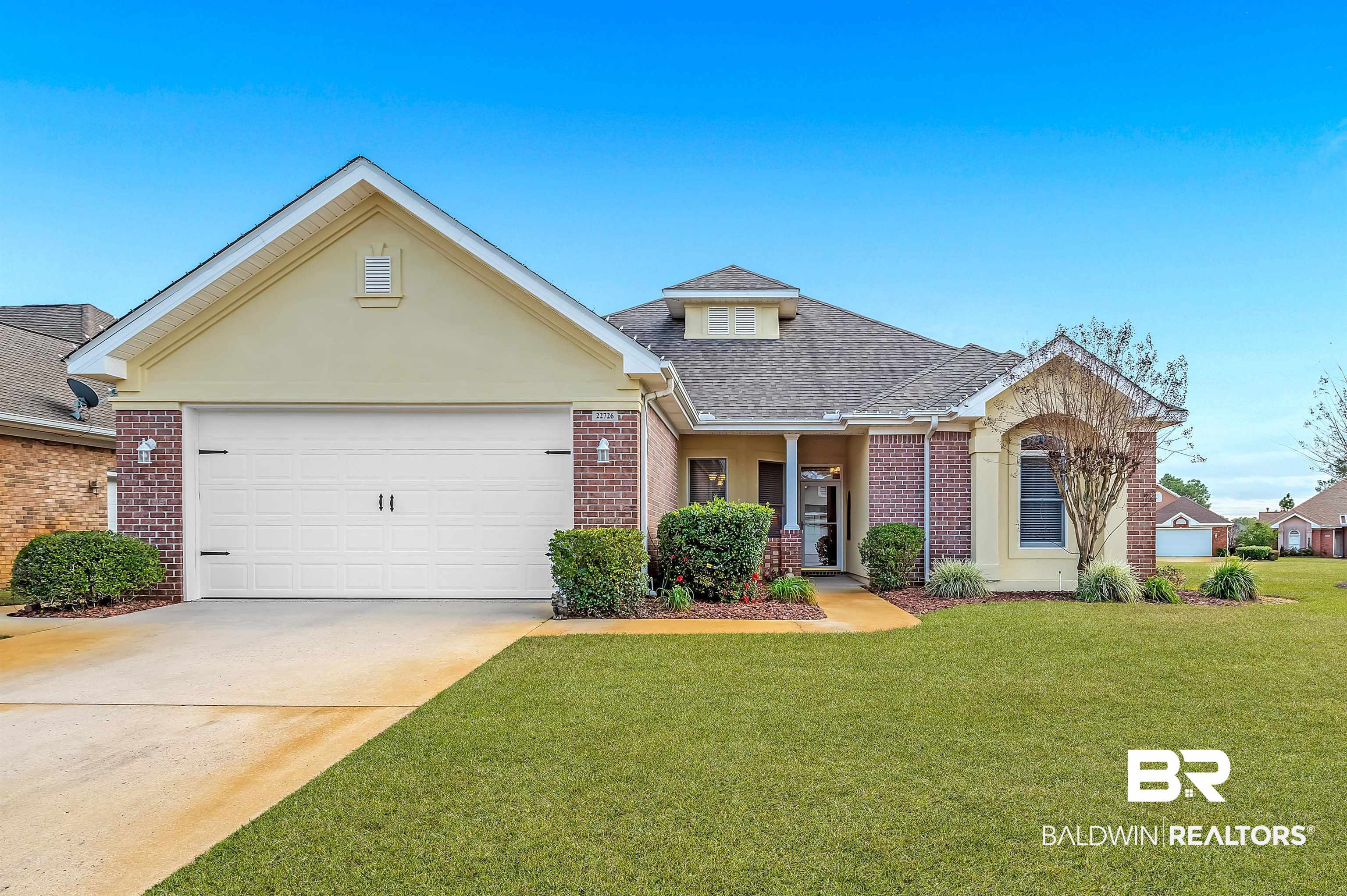 22726 Inverness Way Foley, AL 36535 - Photo 1 of 51 View of front of property with a front yard and a garage