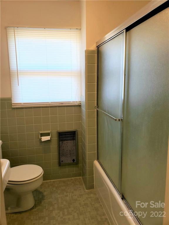 506 8th Street Southwest Conover, NC 28613 - Photo 16 of 38 a bathroom with a toilet and a shower