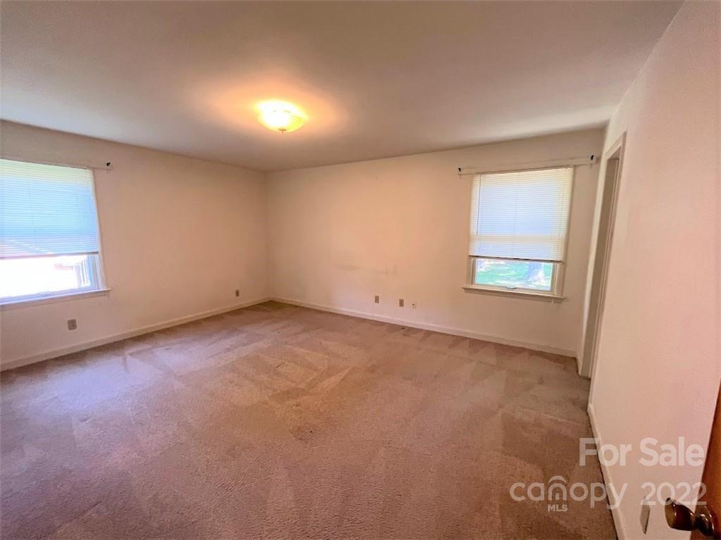 506 8th Street Southwest Conover, NC 28613 - Photo 20 of 38 an empty room with a bench