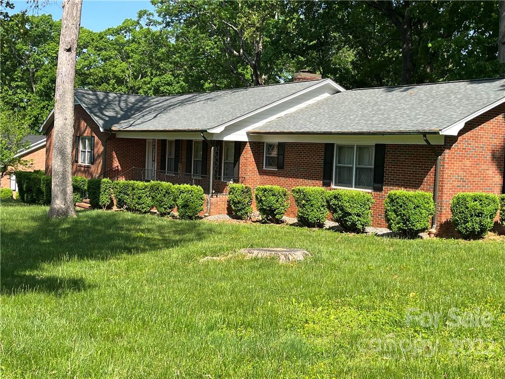 506 8th Street Southwest Conover, NC 28613 - Photo 2 of 38 a view of a house with a big yard plants and large trees