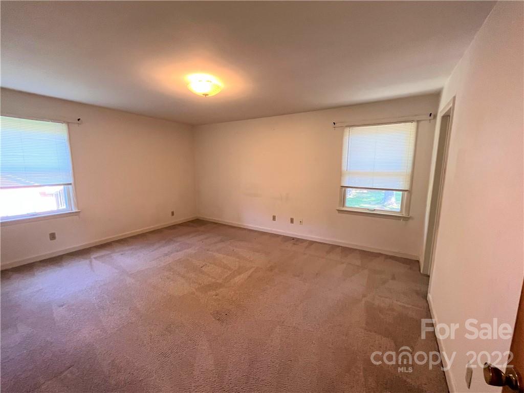 506 8th Street Southwest Conover, NC 28613 - Photo 21 of 38 an empty room with windows